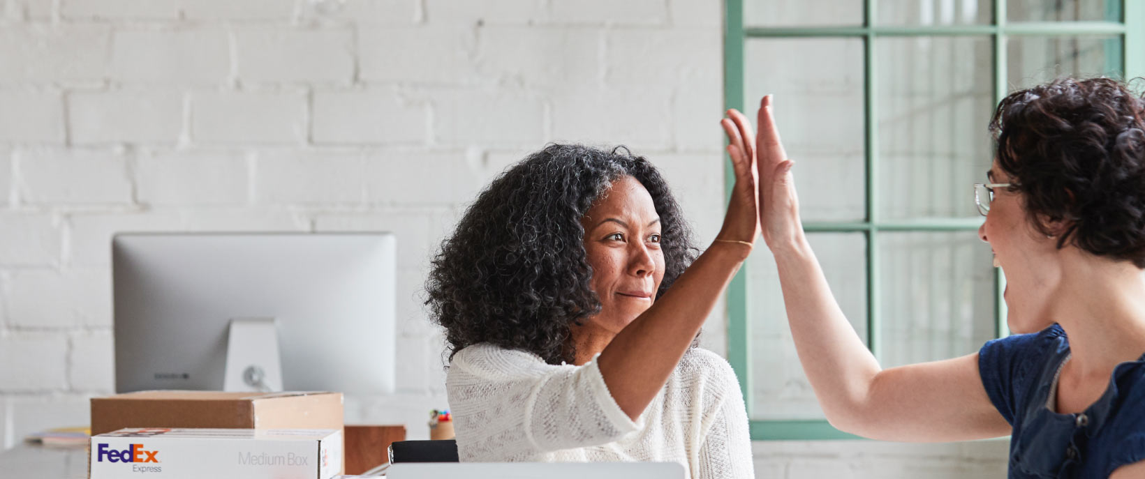 Women celebrating success